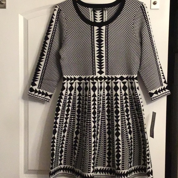 Nina Leonard Dresses & Skirts - NWT Blck n wht knit mini dress. Skater style skirt 3/4 sleeves 2 small 2 lg